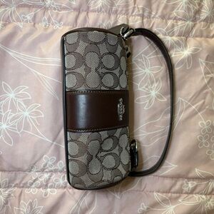 Coach Signature Brown Nolita barrel bag
